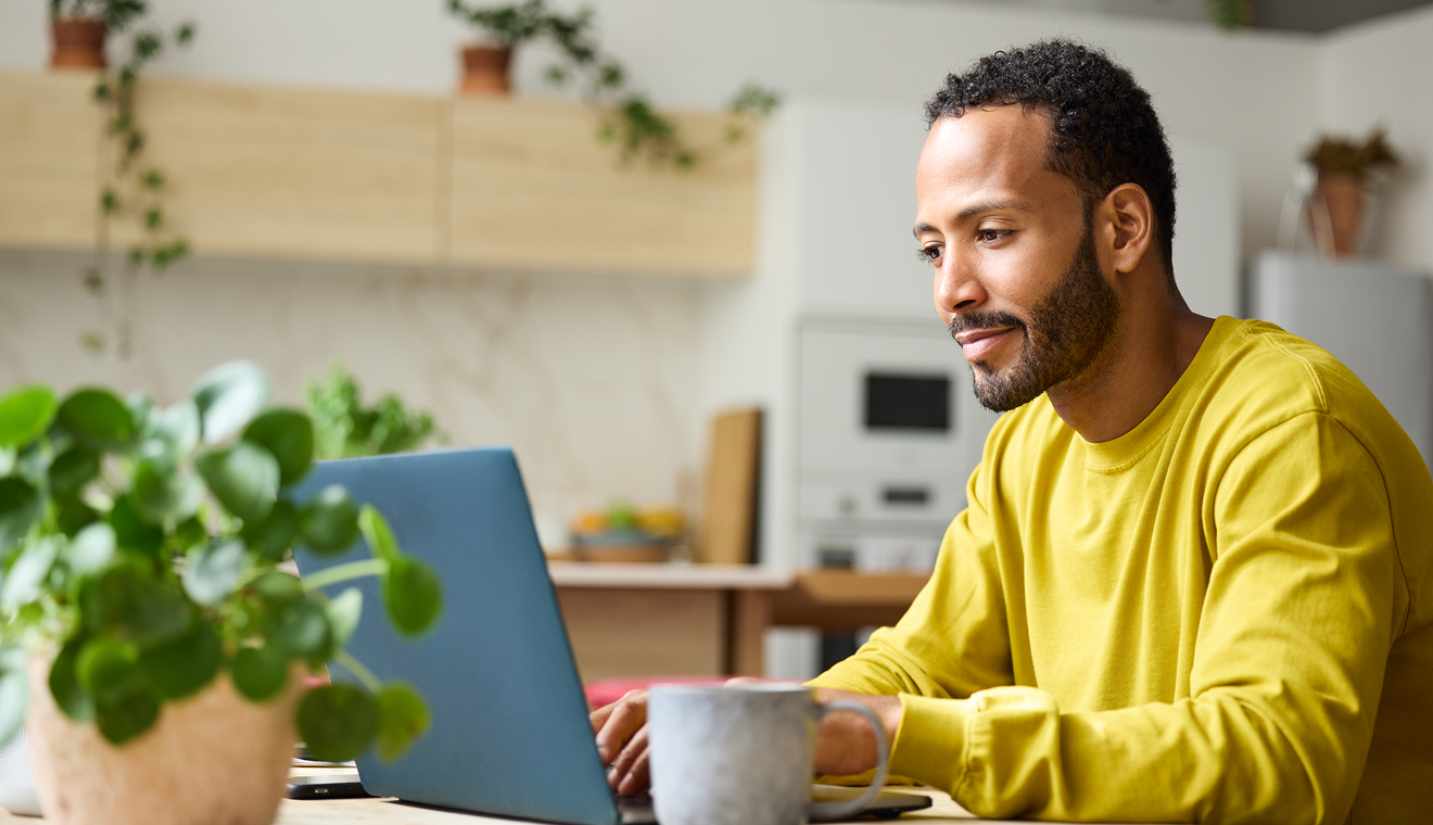 Person working on a laptop at home
