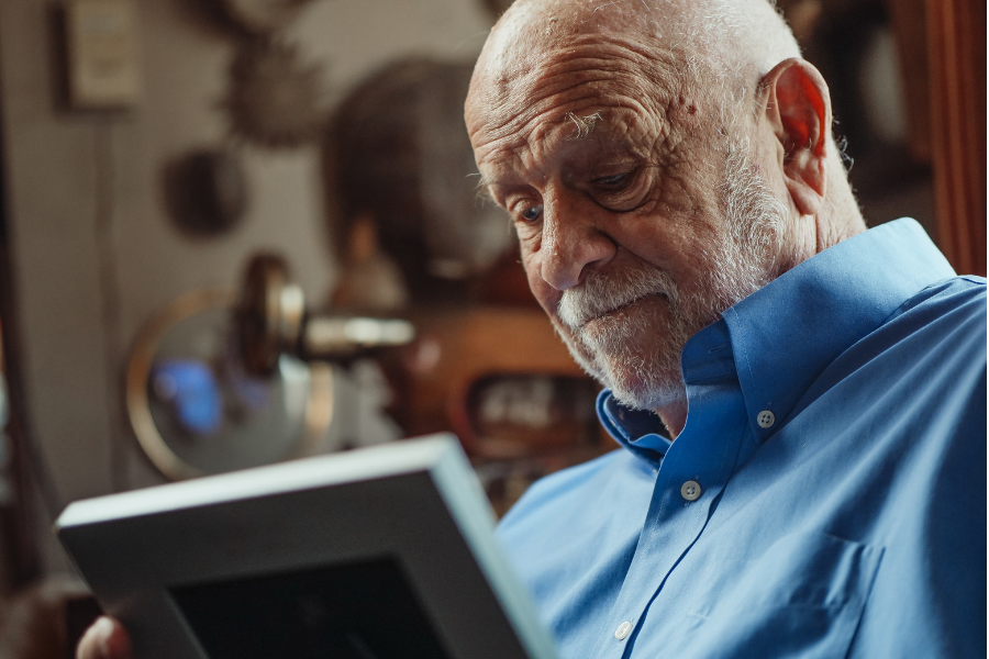 Man looking at picture