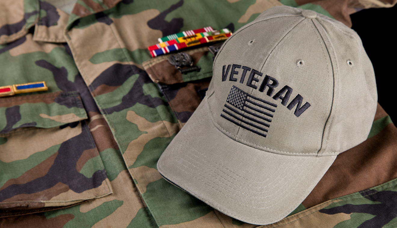 Veteran hat on top of military uniform